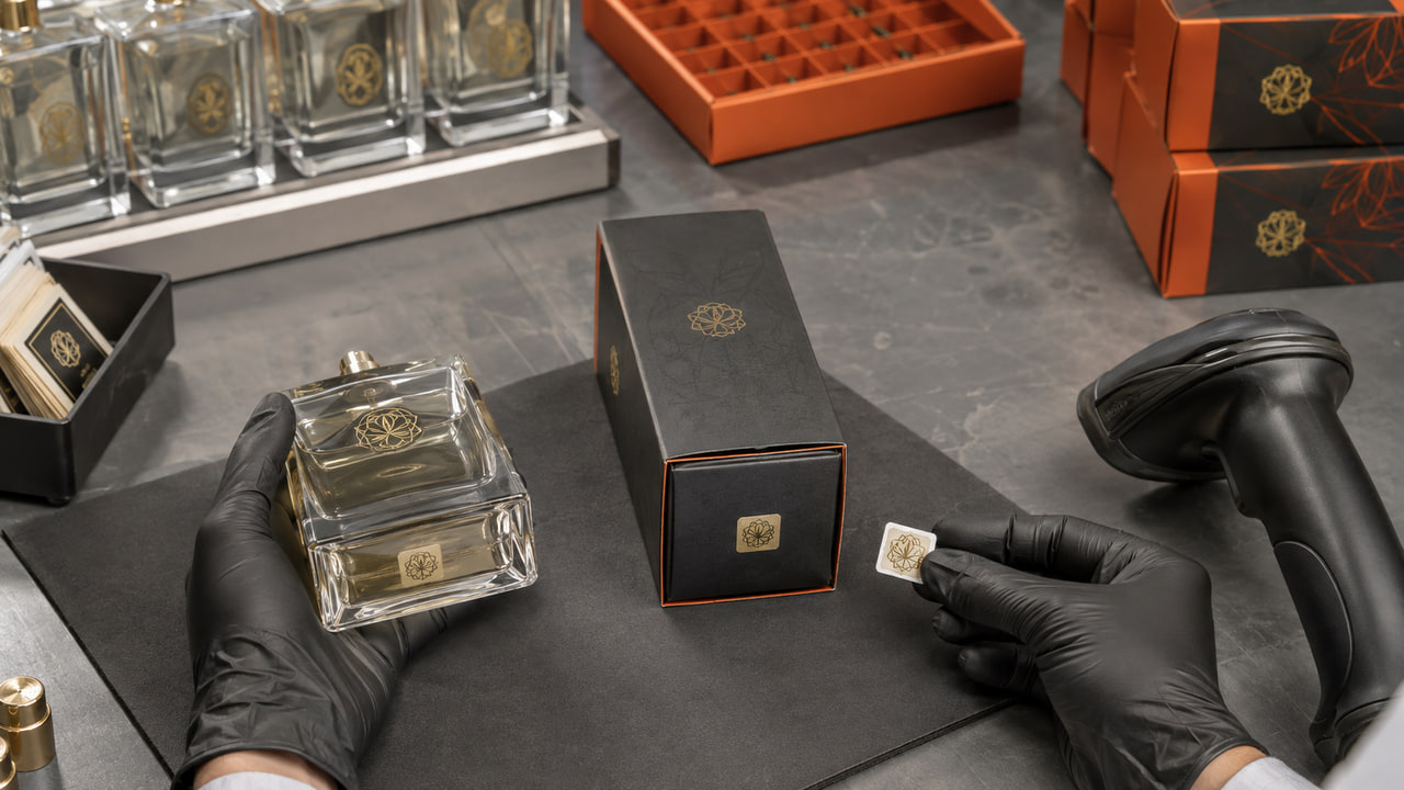 Where should buyers place perfume batch codes for repeat orders?