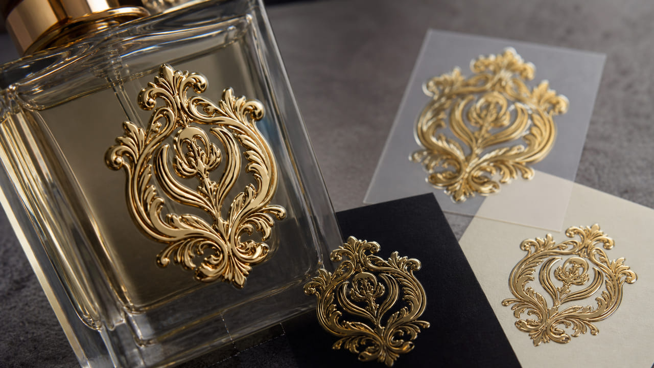 What raised UV DTF logo details look premium on perfume bottles for boutique retail displays?